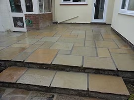 Completed patio installation by One Stop Build & Landscaping